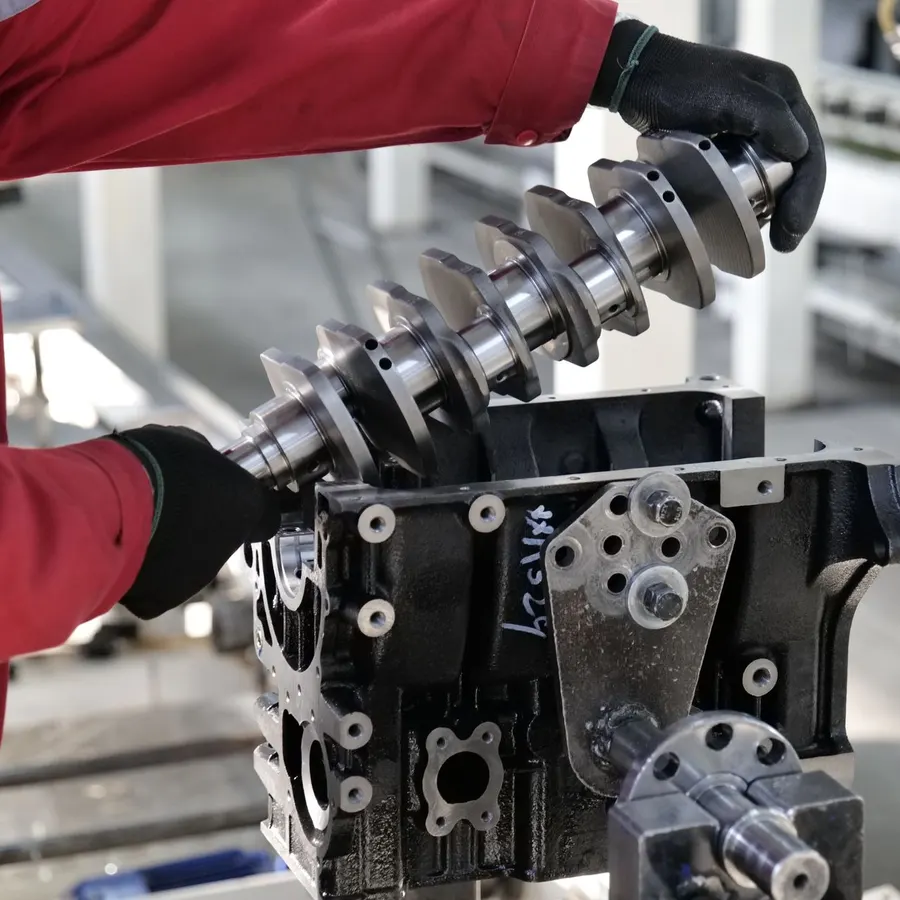 Close view of work on a diesel engine block